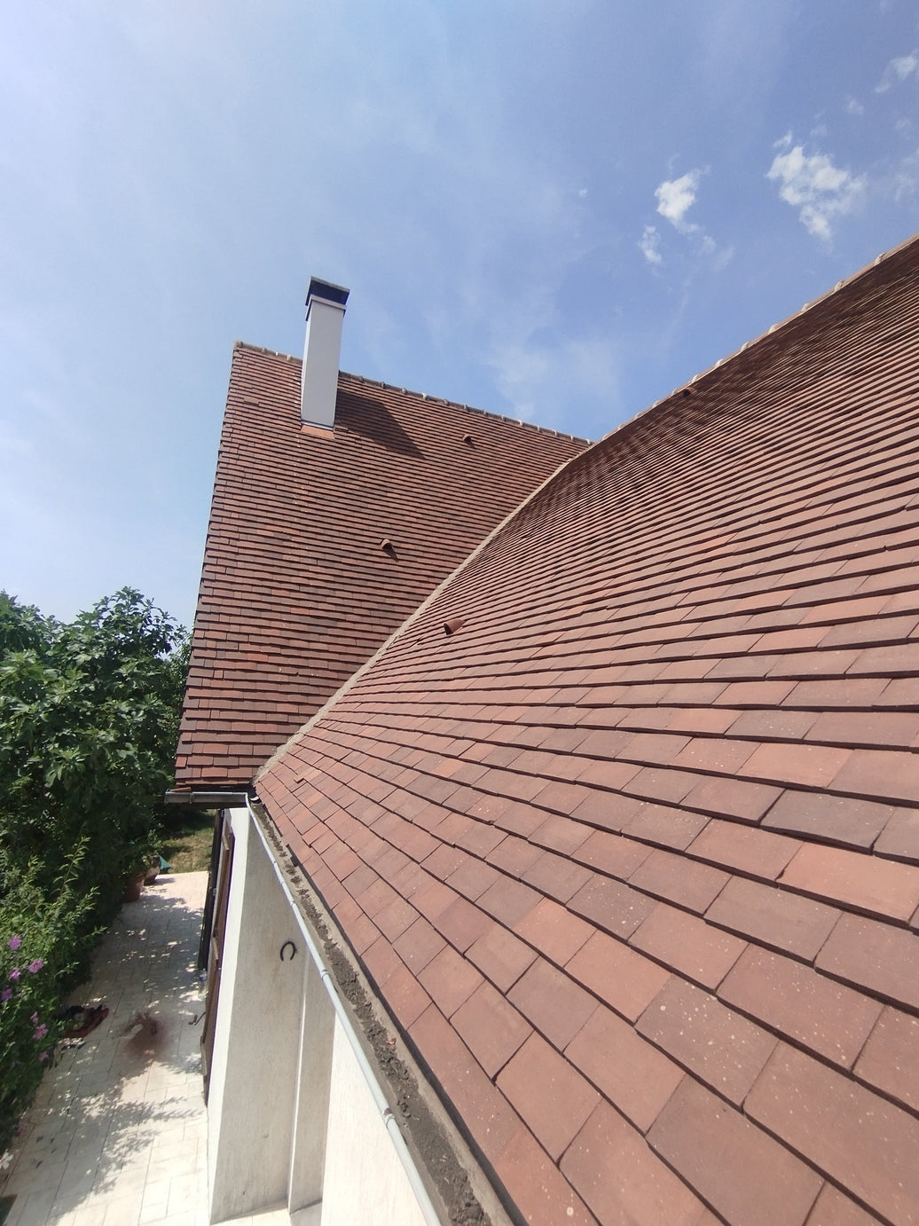 Remplacement de tuiles plates et contrôle de toiture à Conflans-Sainte-Honorine (78700)
